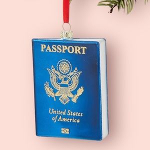 Around the World Passport Book Ornament. It’s beautiful! Great gift for traveler